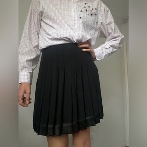 Mini pleated black skirt Patricia Jones, size 4